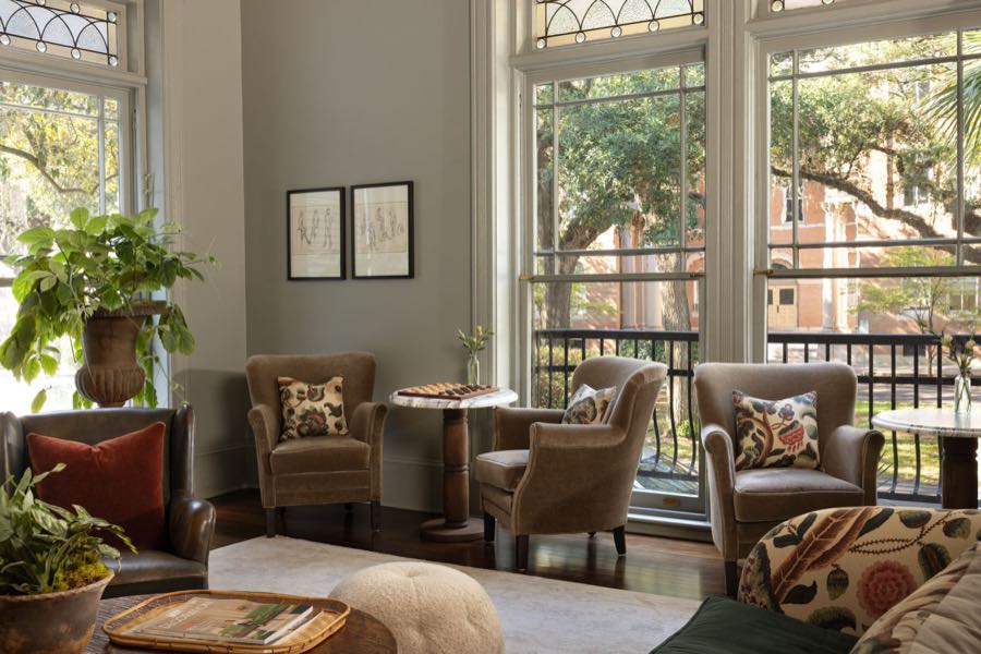 The Parlor, arched windows opening onto the square